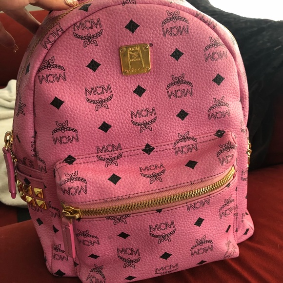 small pink mcm backpack